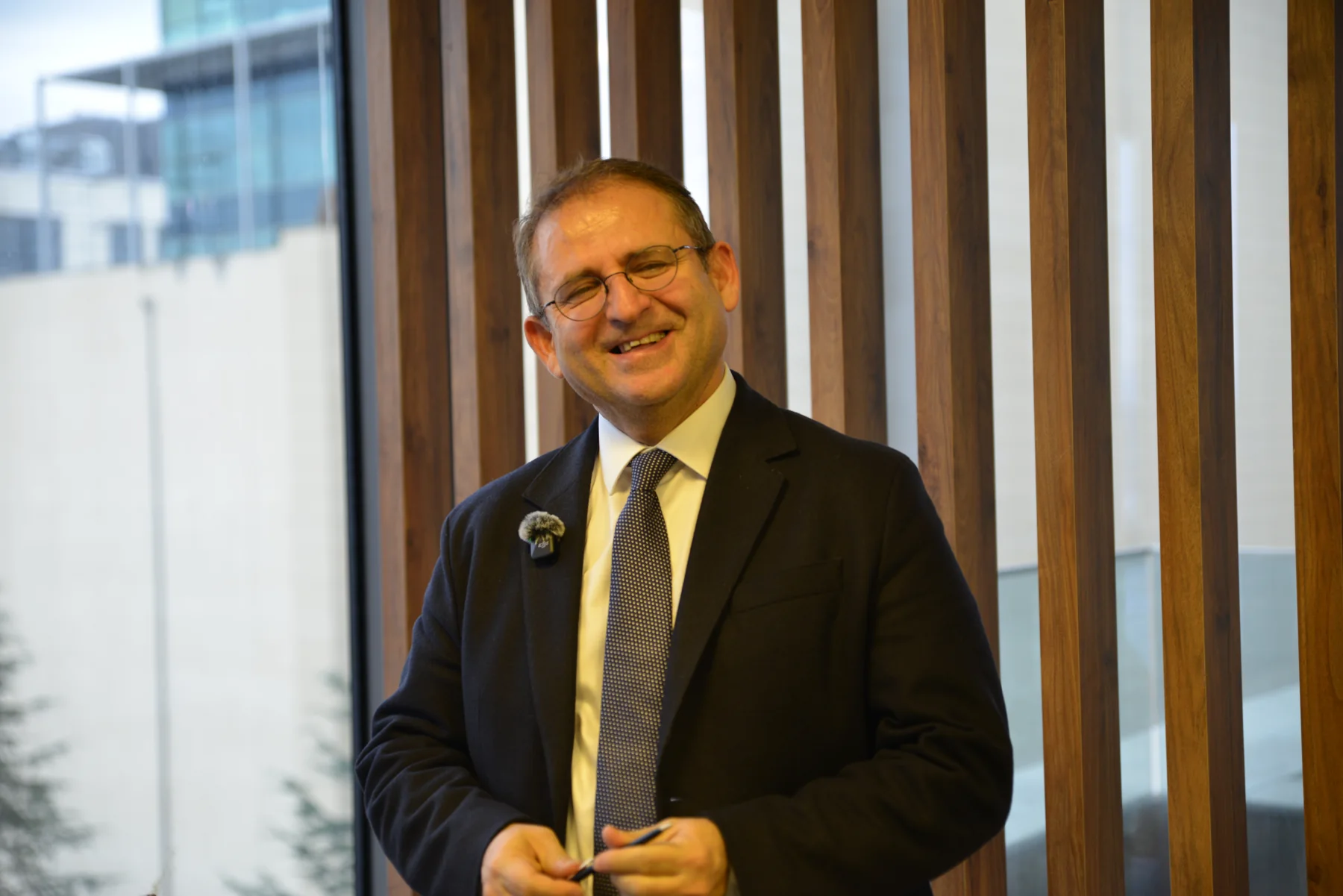Prof. Dr. Mesut Gürdal in a dark suit
